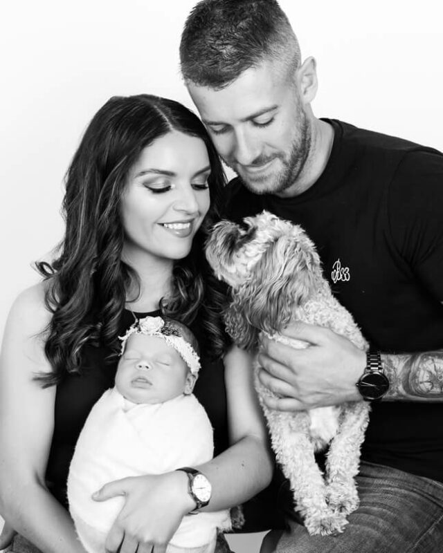 10 Common questions about Newborn Photography family photo with newborn and dog