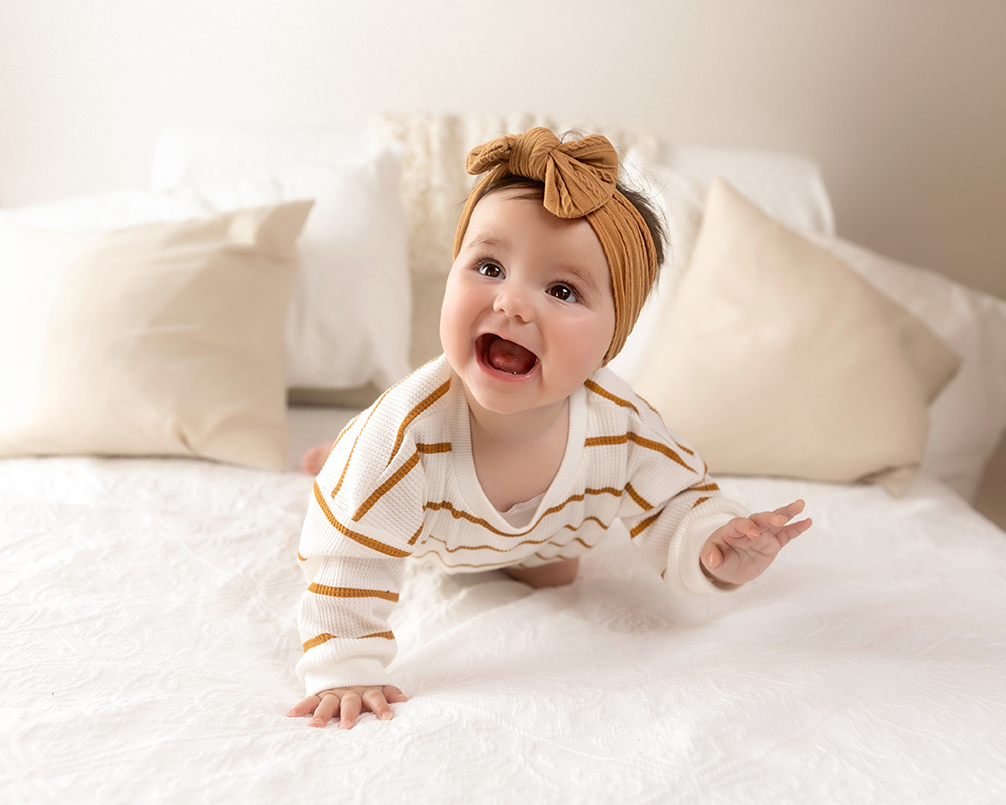 Six-month baby milestone session with neutral tones at Kristy’s Studio, Blue Mountains