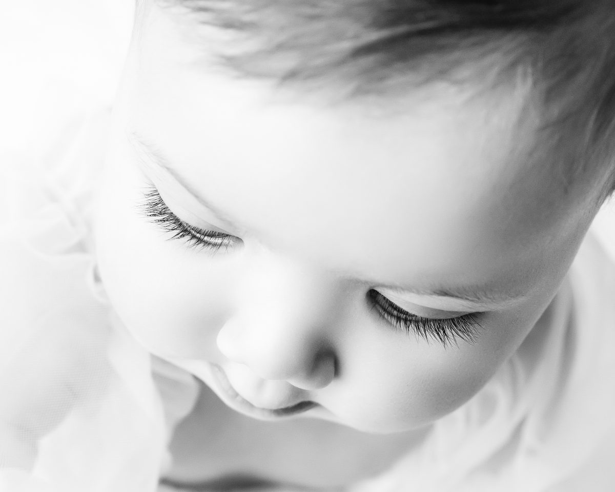 black and white baby photo with eyelashes baby milestone session with neutral tones at Kristy’s Studio, Blue Mountains.