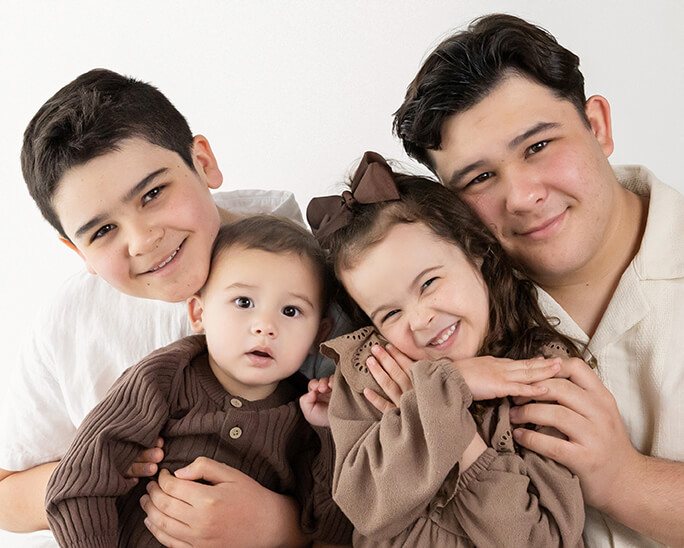 Sibling family portrait at Kristy’s Studio, Blue Mountains — relaxed, joyful moment